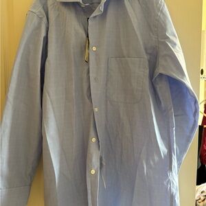 New w/ tags- Mens dress shirt. From Men’s Warehouse.  Light Blue Button-Up Shirt